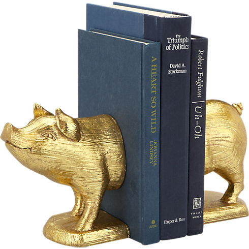gold pig bookends set of 2 in storage | CB2